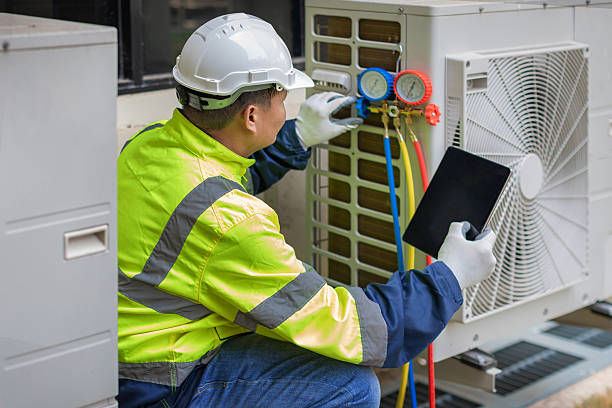 Professional Emergency Ac Repair technician working in Van Hornesville, NY